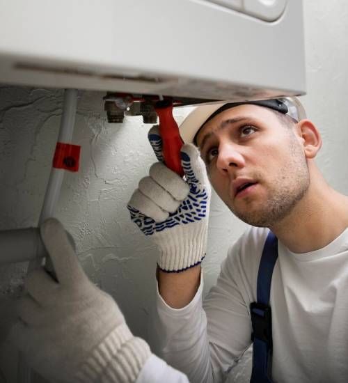 technician testing a newly installed heat pump