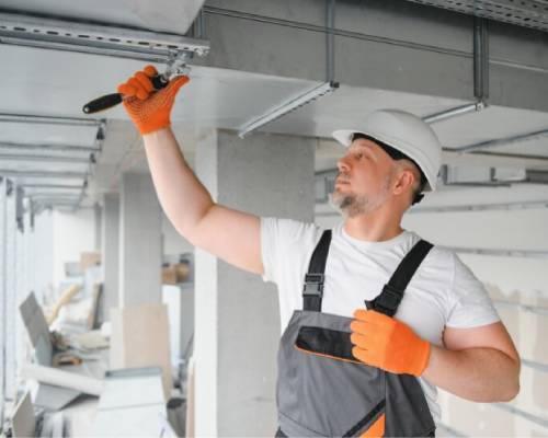 HVAC technicians installing split system Air Conditioning 